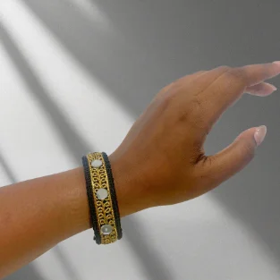 bangle on a hand